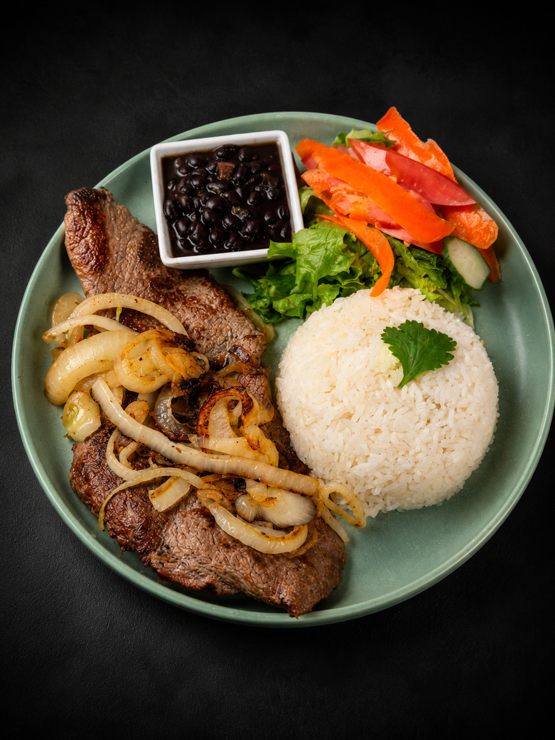 Bistec Encebollado